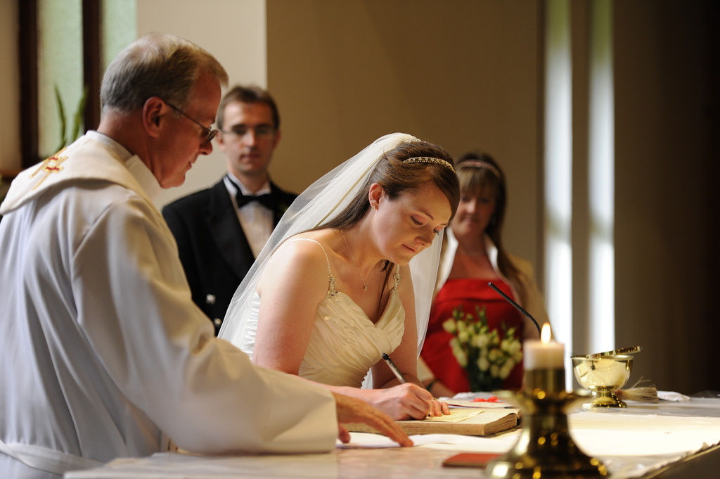 Starla signing the register