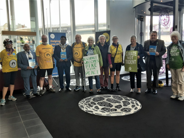 Mayor Ali Ahmed (4th from left) and Consort Sultan Ali (2nd from left) with cyclists and peace activists, Rochdale